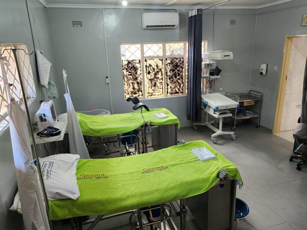A facility with medical equipment and two beds.
