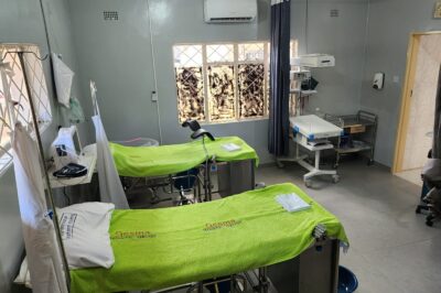 A facility with medical equipment and two beds.