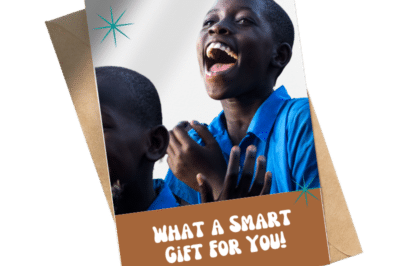 A card with a smiling student alongside the text: "What a smart gift for you!"