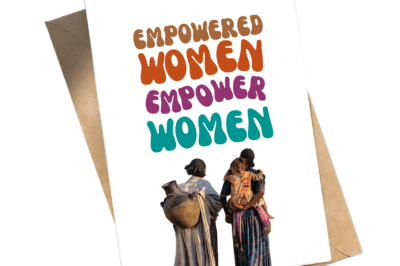 A card with two women and a child alongside the text: "Empowered women empower women."